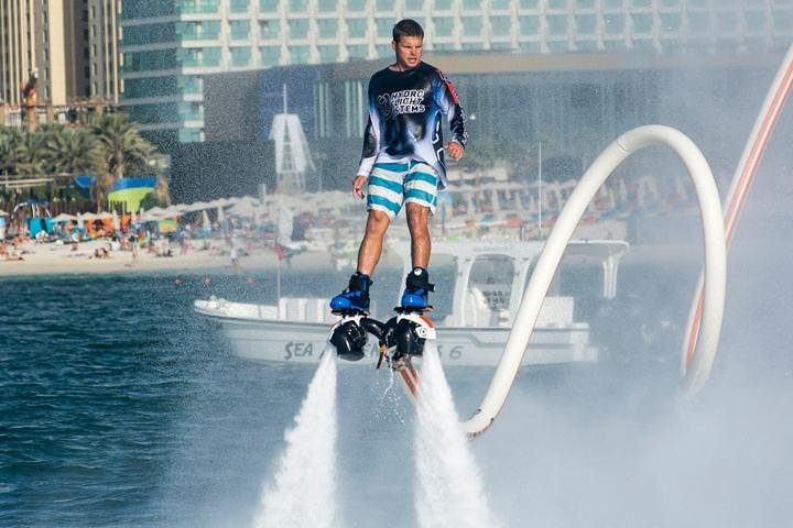 Soar above the azure waters of Dubai with the Jet Blade Flyboard Experience mastering balance and control while enjoying stunning views of the skyline and pristine beaches.